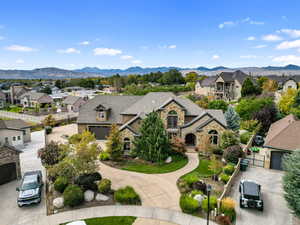 Aerial view of residential area with a mountainous background