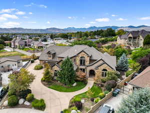 Aerial perspective of suburban area with a mountain backdrop