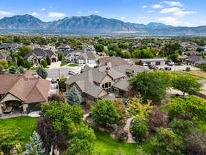 Aerial view of residential area featuring a mountain backdrop