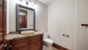 Bathroom with vanity and toilet