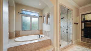 Bathroom with a shower stall, a bath, crown molding, tile patterned floors, and recessed lighting