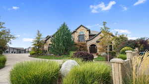 View of front of home featuring stone siding