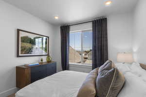 Bedroom with baseboards and recessed lighting