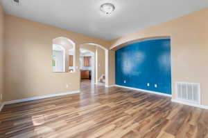 Living Room facing Kitchen and Stairs