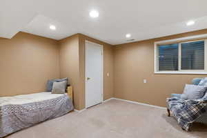 Bedroom featuring carpet and recessed lighting