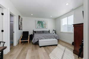 Bedroom featuring light wood-style floors and recessed lighting