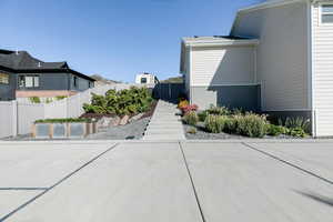View of property exterior with a fenced backyard