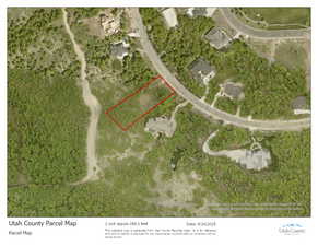 Aerial overview of property's location featuring property parcel outlined