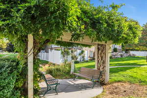View of property's community featuring a patio area