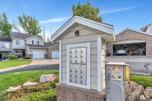 View of property's community featuring mail area