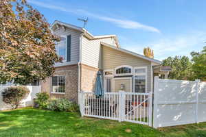 View of front facade featuring brick siding
