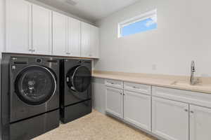 Main Laundry Room Upstairs with Sink