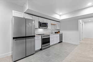 FULL kitchen in the basement for entertaining or hosting