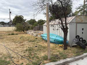 View of yard with a shed