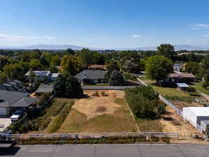 Aerial perspective of suburban area with a mountain backdrop
