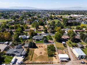 Aerial view of residential area featuring a mountain backdrop