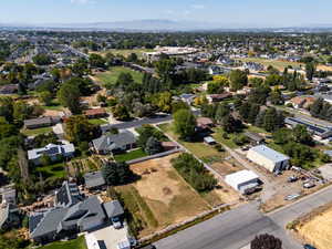 Aerial view of residential area featuring a mountain backdrop