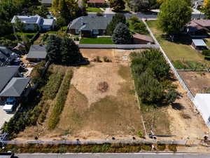 Aerial view of property's location featuring nearby suburban area