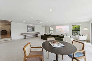 Dining room featuring carpet flooring and recessed lighting