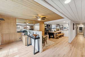 Kitchen featuring wood ceiling, light wood-type flooring, ceiling fan, and recessed lighting