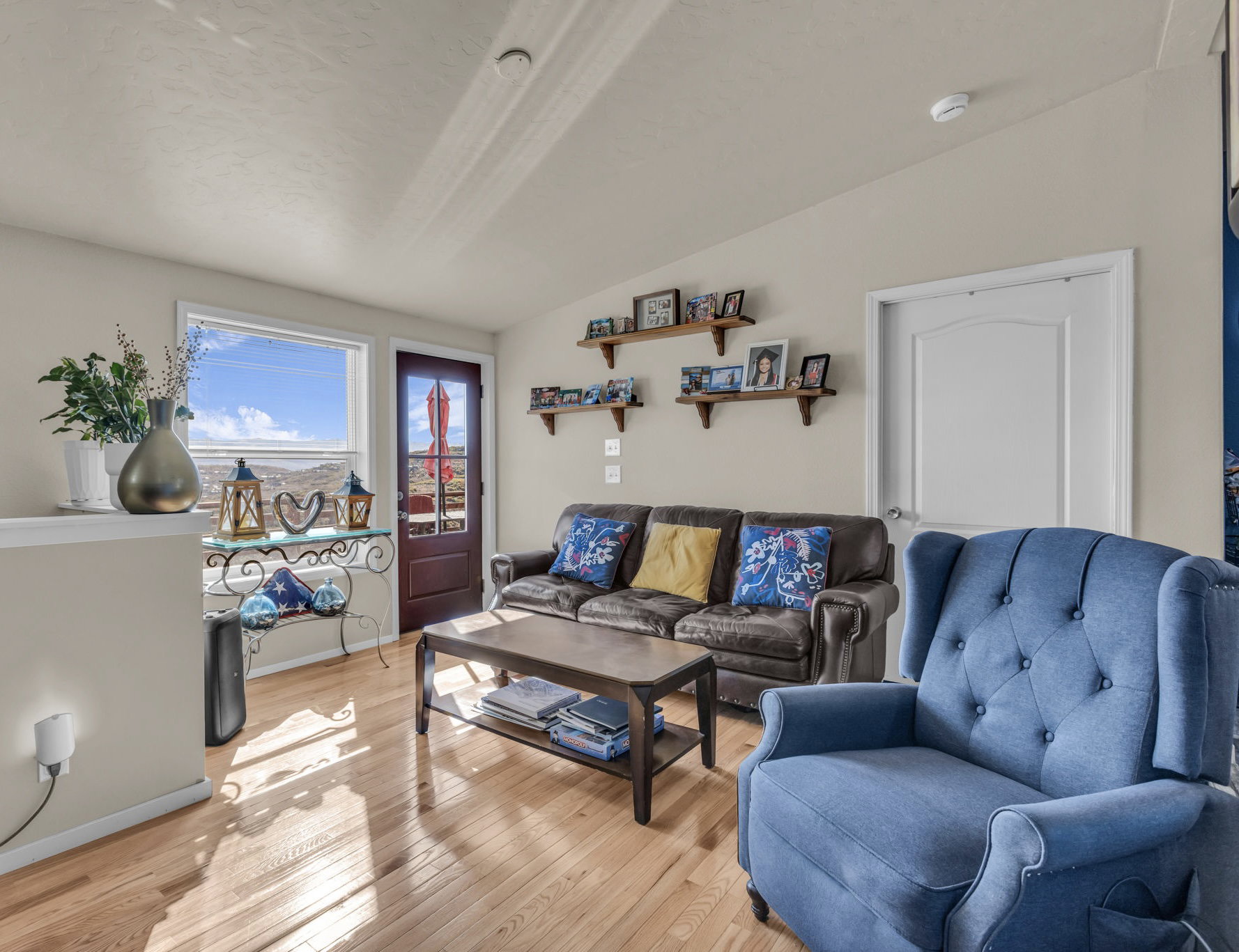 Living area with light wood-style flooring
