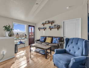 Living area with light wood-style flooring