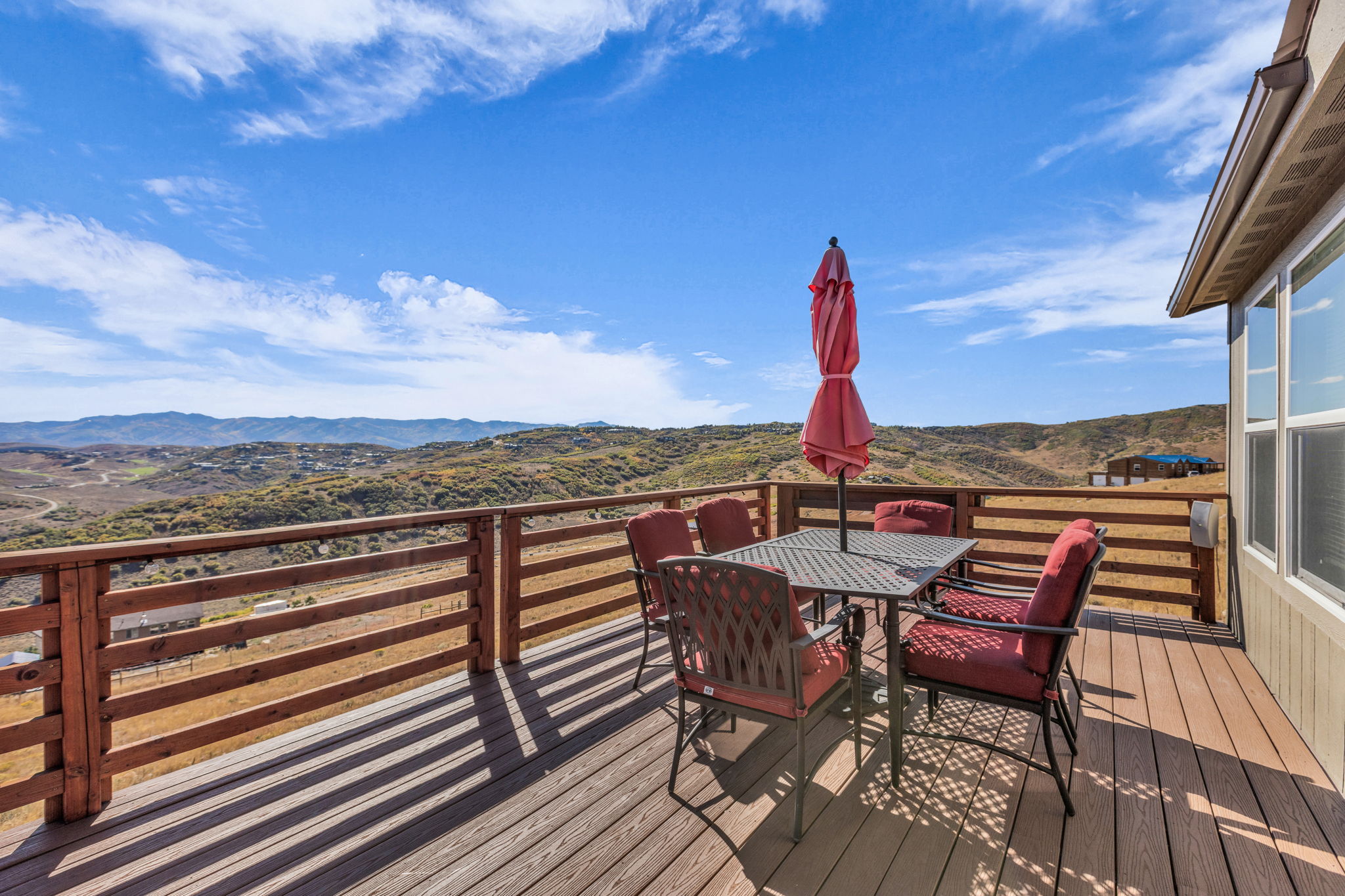 Open outdoor deck featuring a mountain view