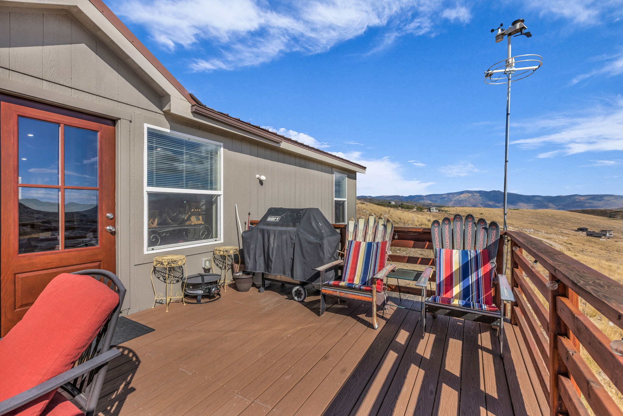 Open outdoor deck featuring a mountain view