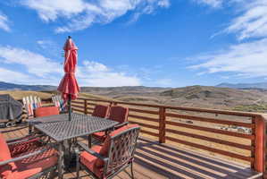 Open outdoor deck featuring a mountain view