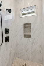 Full bath with a shower stall