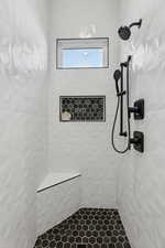 Bathroom with a tile shower