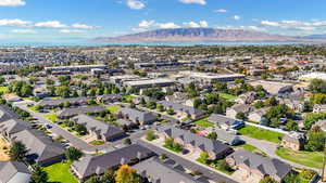 Aerial view of residential area featuring a mountainous background