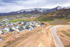 View of property location featuring a mountainous background and nearby suburban area