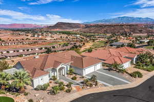 Aerial view of residential area with a mountain backdrop