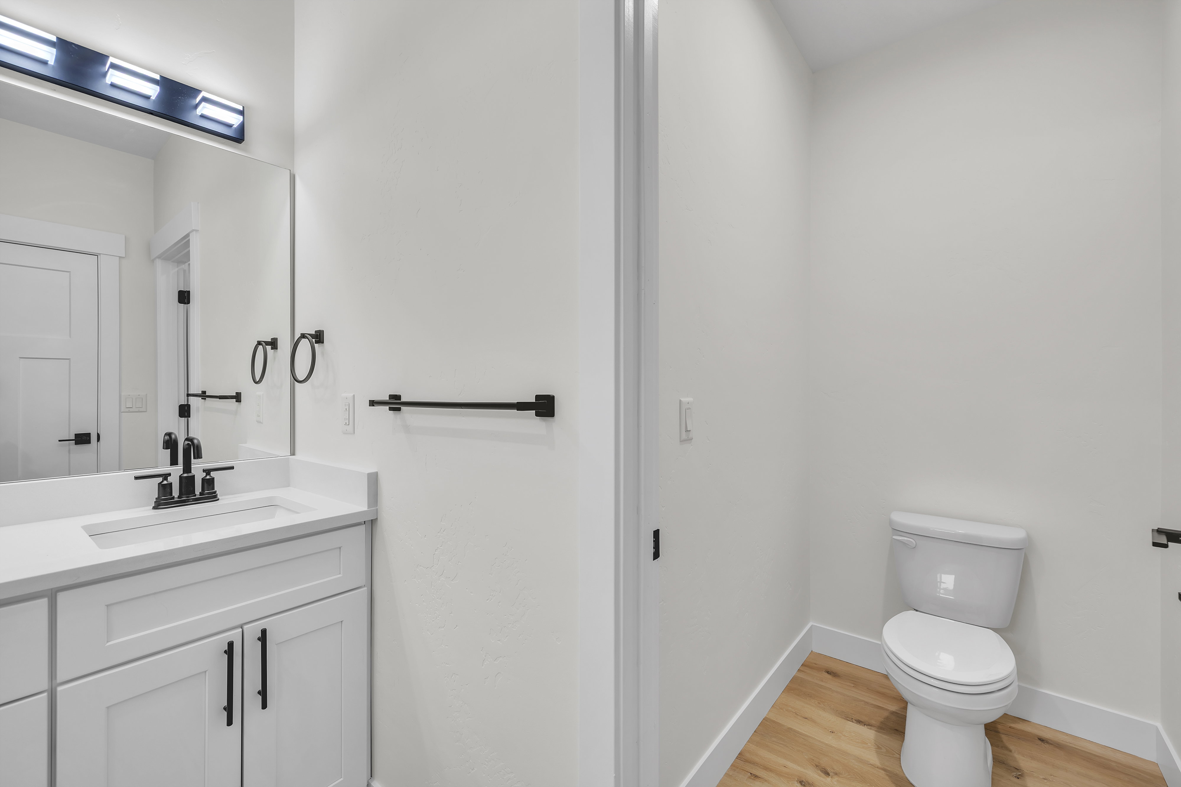 Master Bathroom private toilet closet.