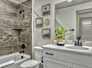 Full bath with shower / bath combination and vanity