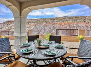 View of patio with outdoor dining area