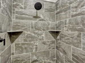 Bathroom featuring tiled shower