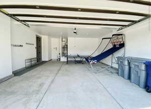 Garage featuring secured water heater