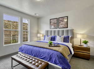 Carpeted bedroom featuring baseboards