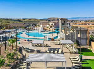 Aerial view of residential area featuring a mountainous background