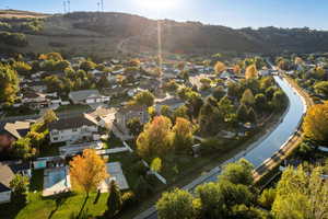 Aerial view of residential area with a water and mountain view