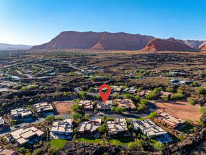 Aerial view of residential area with a mountain backdrop