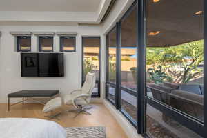 Bedroom with wood finished floors