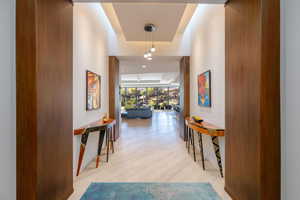 Hall featuring light wood-style flooring