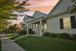 View of front of home featuring a yard
