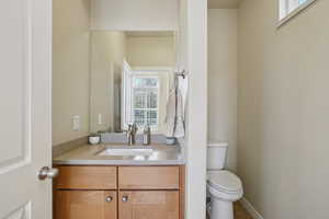 Bathroom featuring healthy amount of natural light and vanity