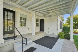 Porch featuring a ceiling fan