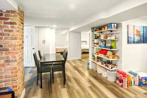 Dining area featuring light wood-style flooring