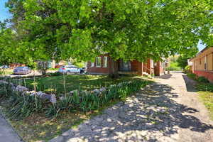 View of side of home with brick siding